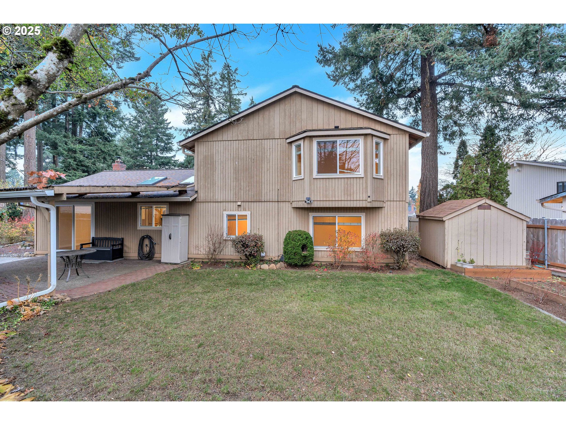 814 Northeast 196th Avenue Portland, OR 97230 - Photo 32 of 44 a view of a house with a yard and sitting area