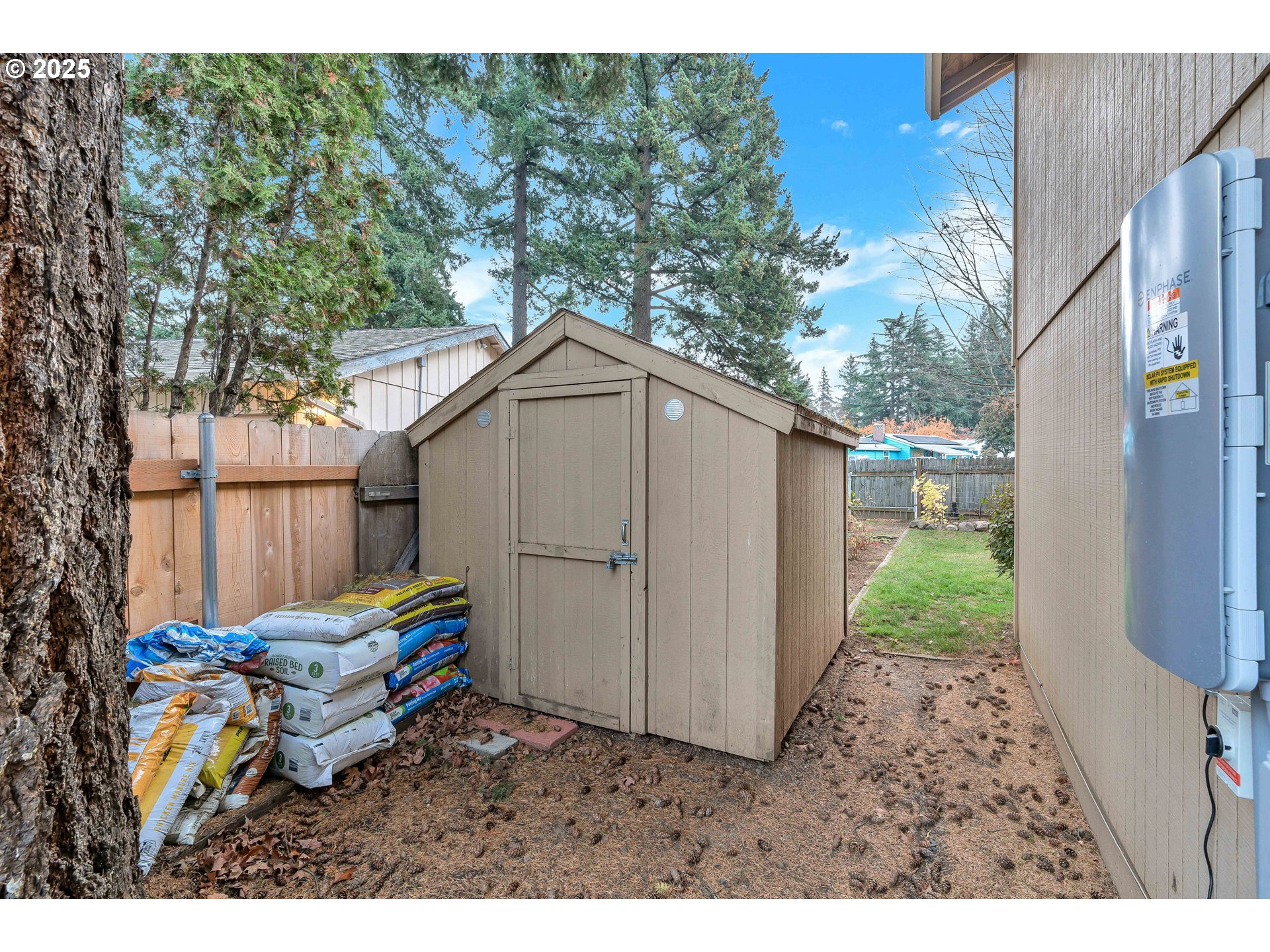 814 Northeast 196th Avenue Portland, OR 97230 - Photo 36 of 44 a backyard of a house with barbeque oven table and chairs