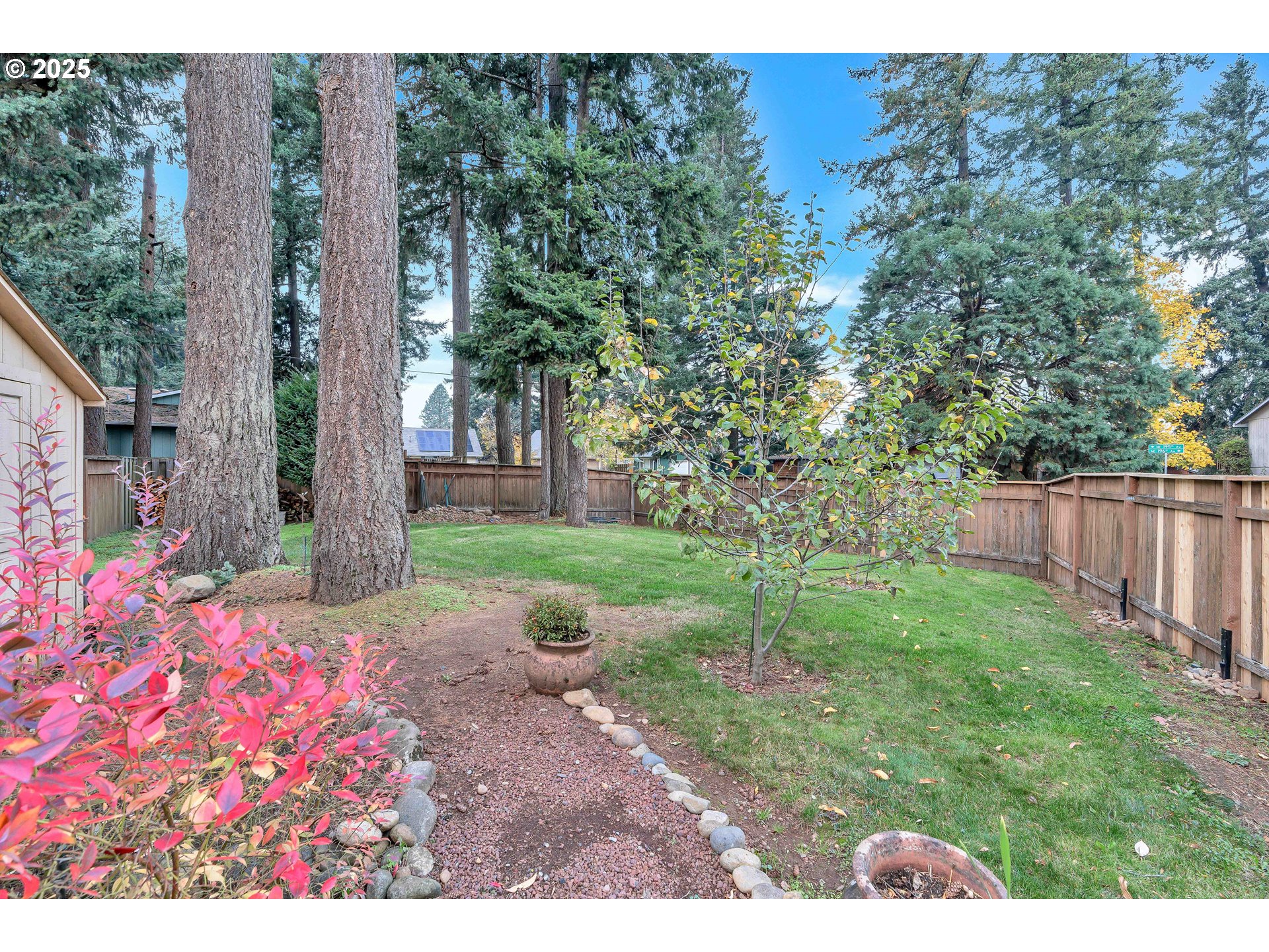 814 Northeast 196th Avenue Portland, OR 97230 - Photo 38 of 44 a backyard of a house with lots of green space