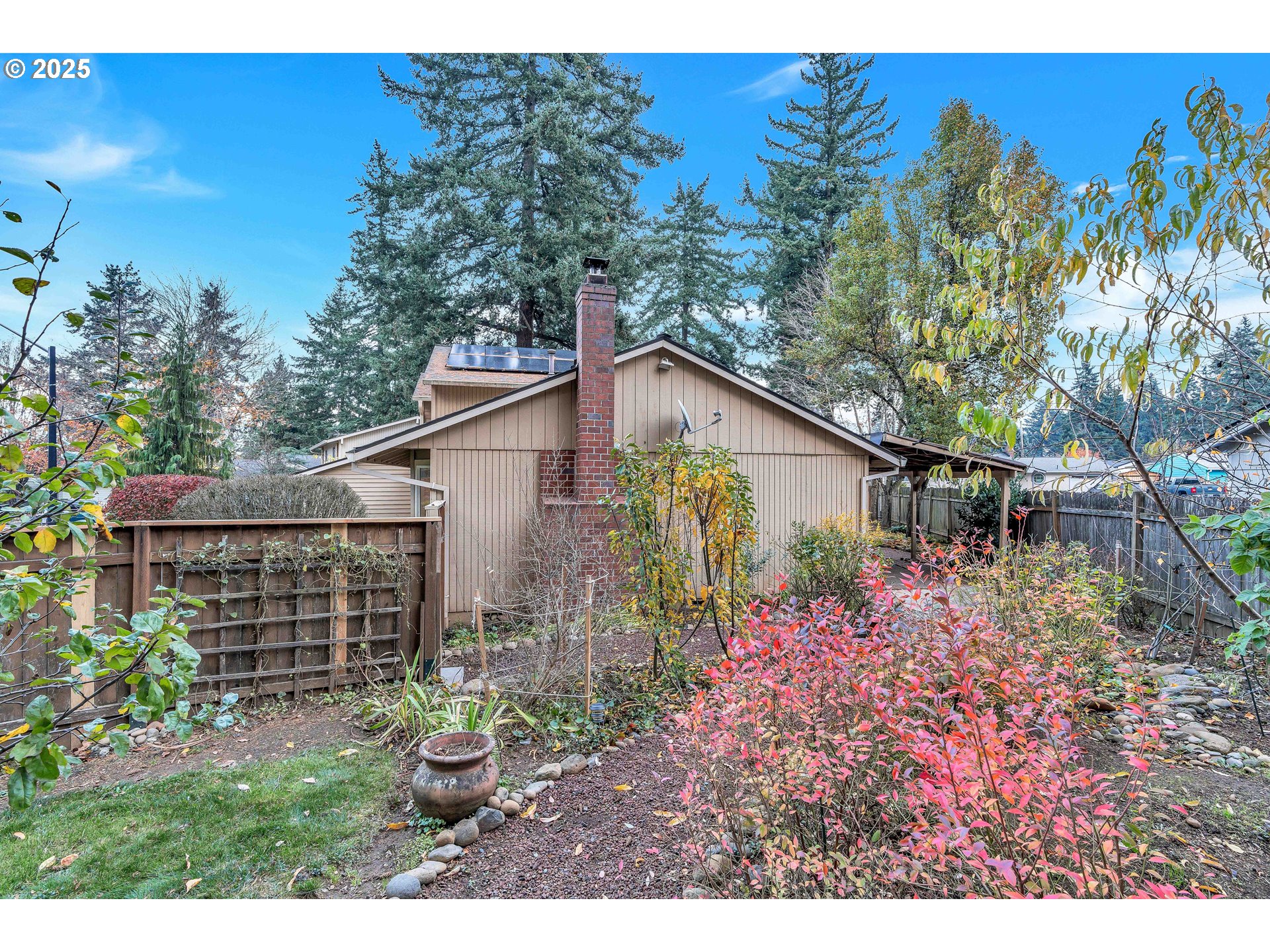 814 Northeast 196th Avenue Portland, OR 97230 - Photo 39 of 44 a backyard of a house with lots of green space