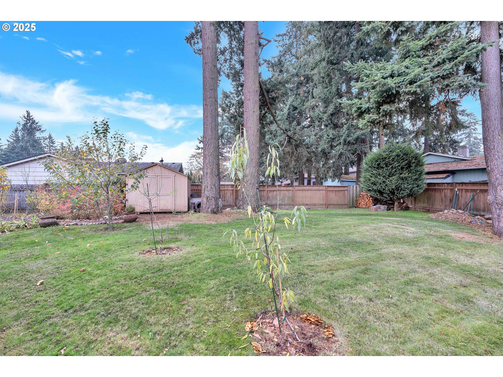 814 Northeast 196th Avenue Portland, OR 97230 - Photo 40 of 44 a backyard of a house with lots of green space