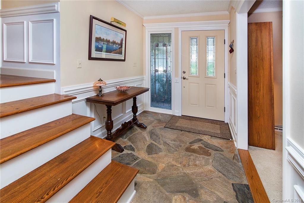 3910 Lake Shore Road South Denver, NC 28037 - Photo 2 of 25 a view of a bedroom with furniture and window