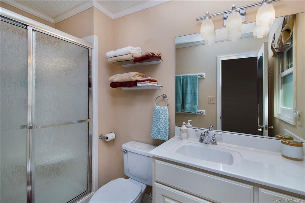 3910 Lake Shore Road South Denver, NC 28037 - Photo 11 of 25 a bathroom with a sink toilet and shower