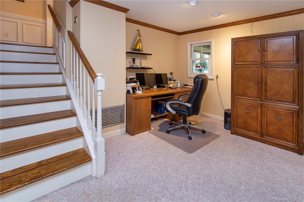 3910 Lake Shore Road South Denver, NC 28037 - Photo 14 of 25 a view of a workspace with furniture and a window