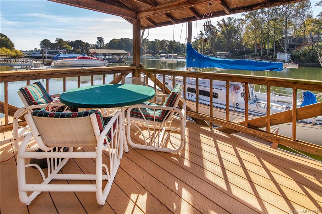 3910 Lake Shore Road South Denver, NC 28037 - Photo 22 of 25 a view of a chairs and table on the balcony