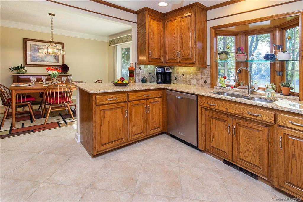 3910 Lake Shore Road South Denver, NC 28037 - Photo 8 of 25 a kitchen with cabinets a sink and appliances