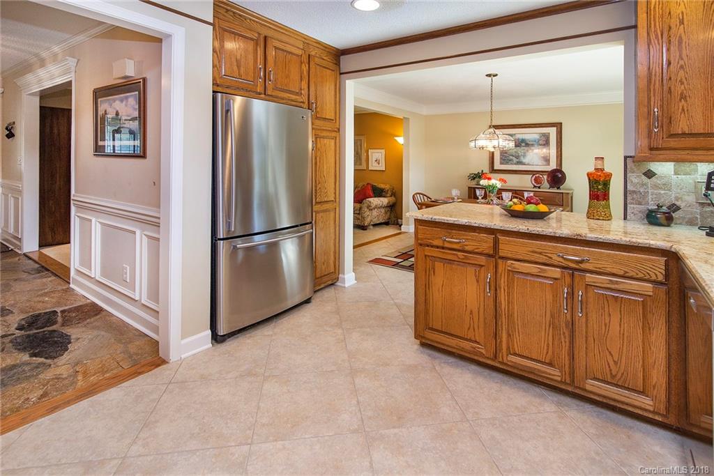 3910 Lake Shore Road South Denver, NC 28037 - Photo 9 of 25 a kitchen with stainless steel appliances a refrigerator and a sink