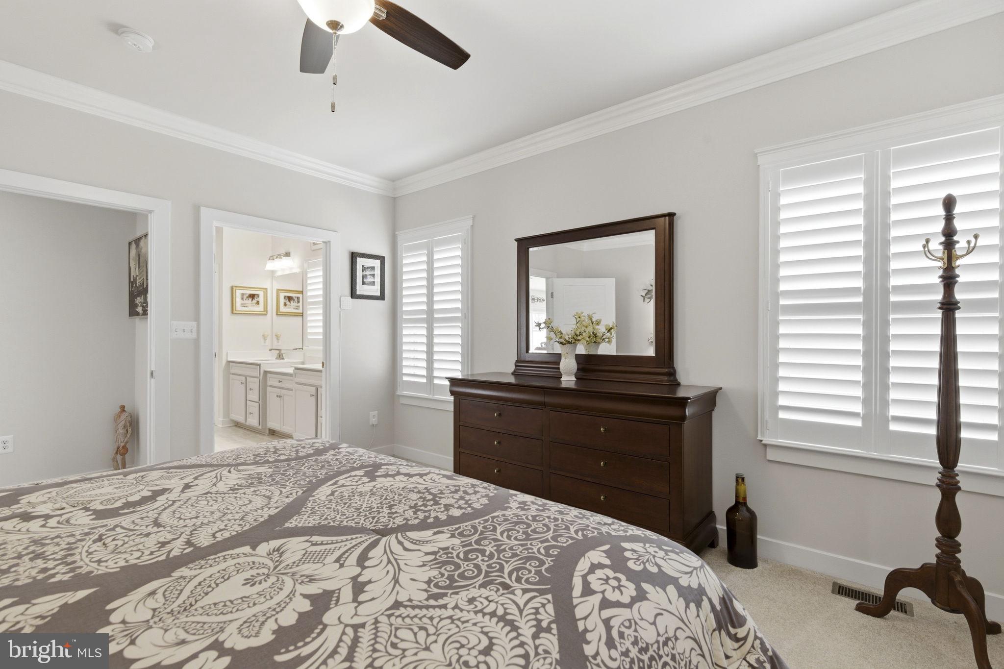 703 Cornerstone Lane Aberdeen, MD 21001 - Photo 14 of 53 a bedroom with a bed and a chandelier