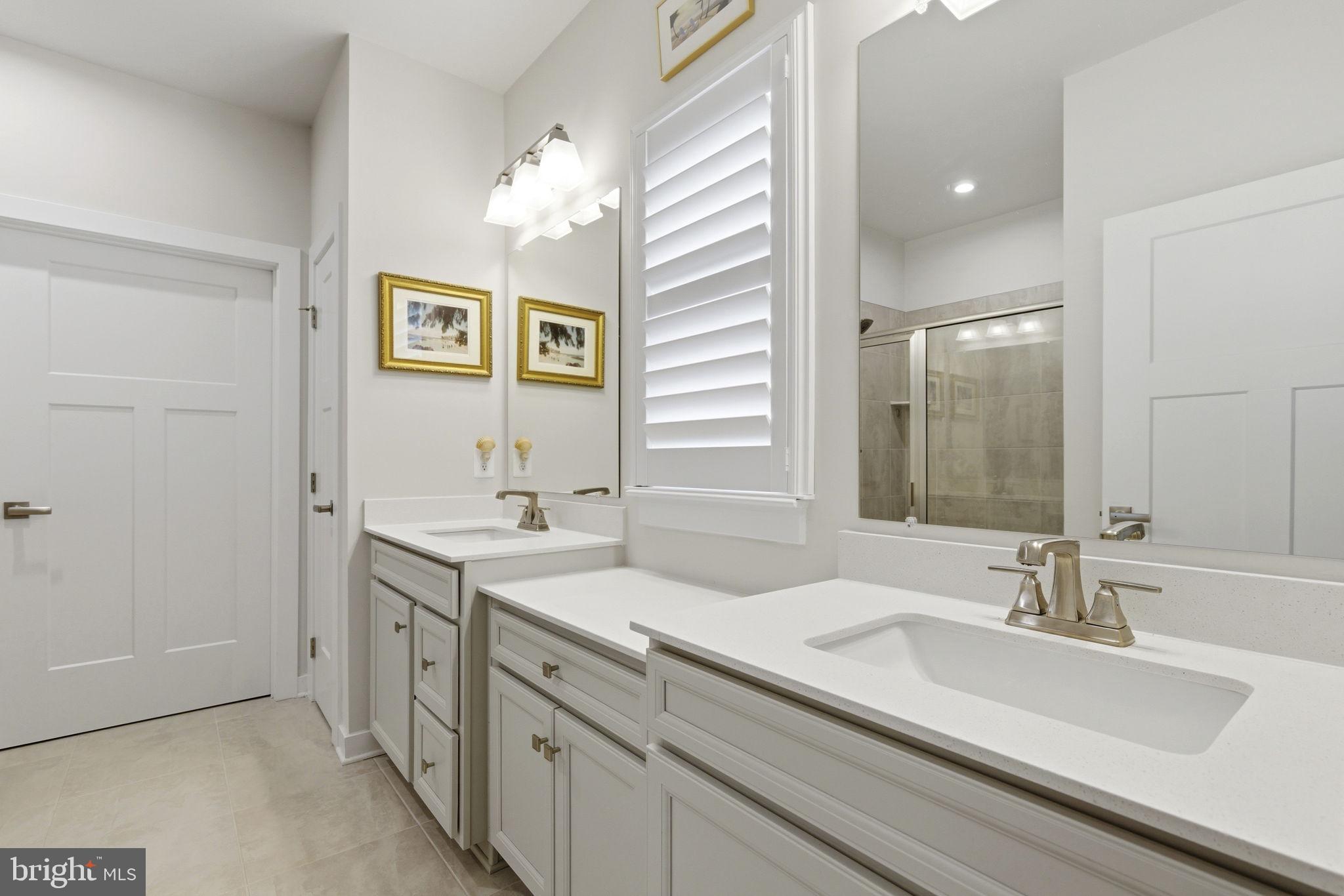 703 Cornerstone Lane Aberdeen, MD 21001 - Photo 15 of 53 a bathroom with a sink and a mirror