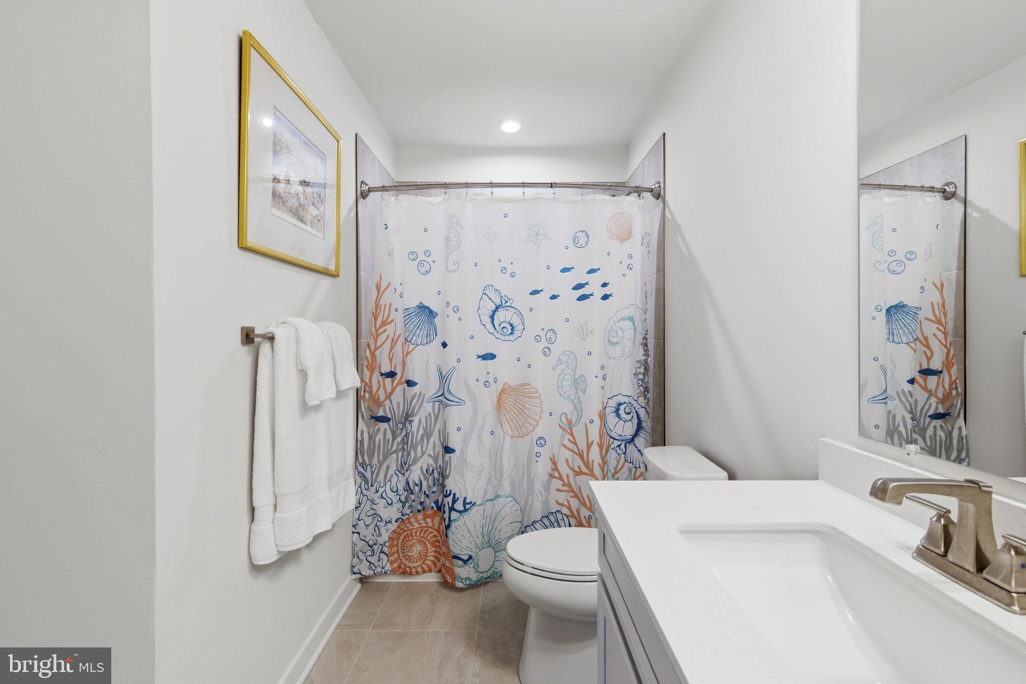 703 Cornerstone Lane Aberdeen, MD 21001 - Photo 29 of 53 a bathroom with a sink toilet and shower