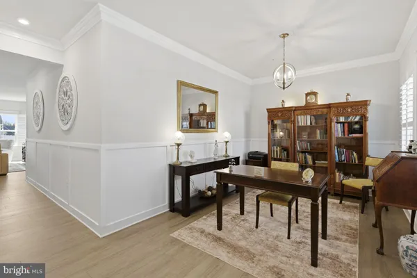a view of a livingroom with furniture and window