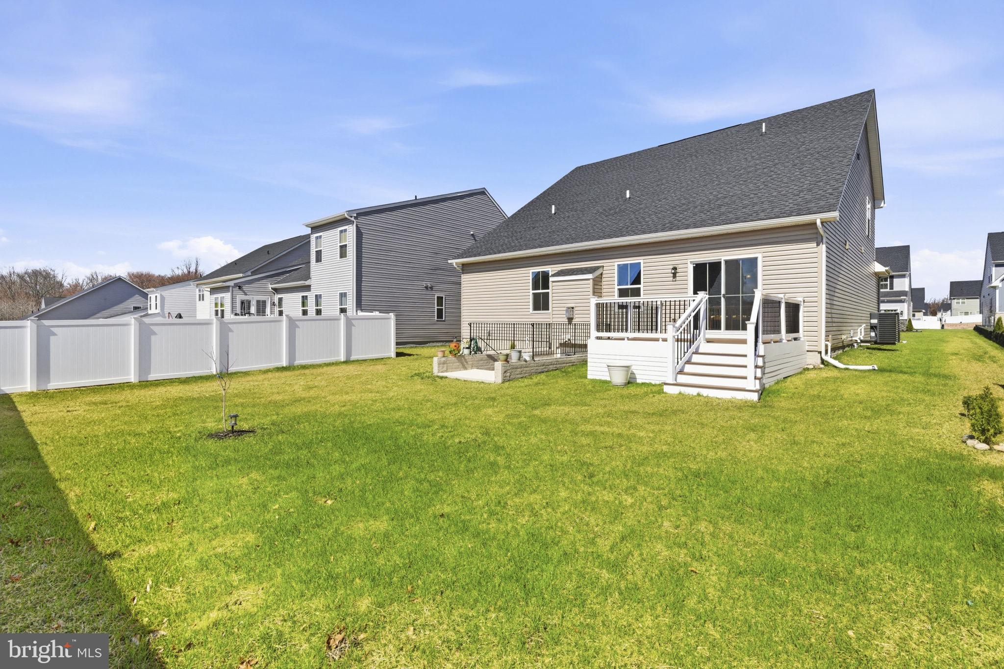 703 Cornerstone Lane Aberdeen, MD 21001 - Photo 40 of 53 a view of a house with a backyard porch and sitting area
