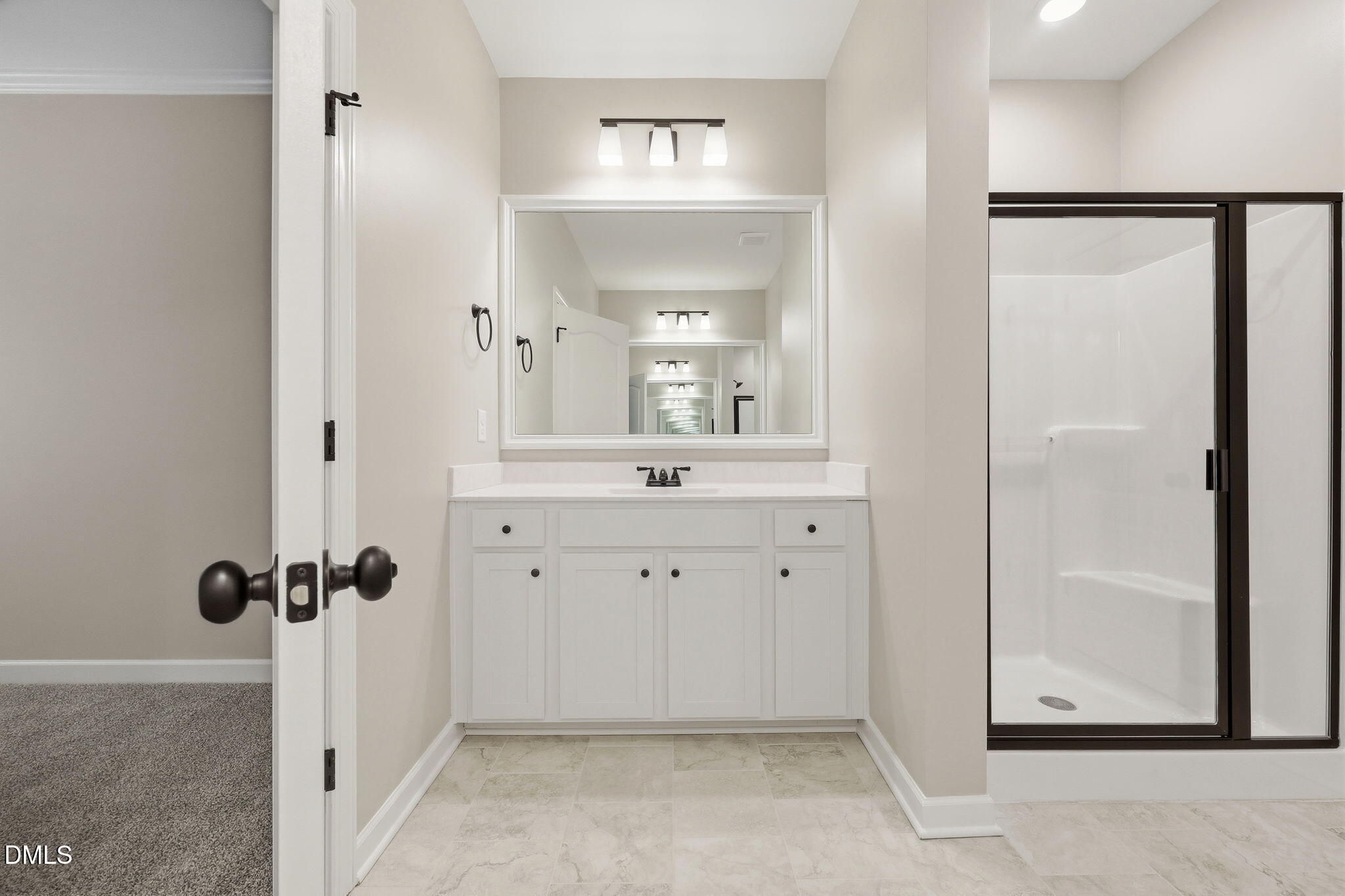 146 Seahawk Way Zebulon, NC 27597 - Photo 25 of 51 a view of a bathroom with a shower