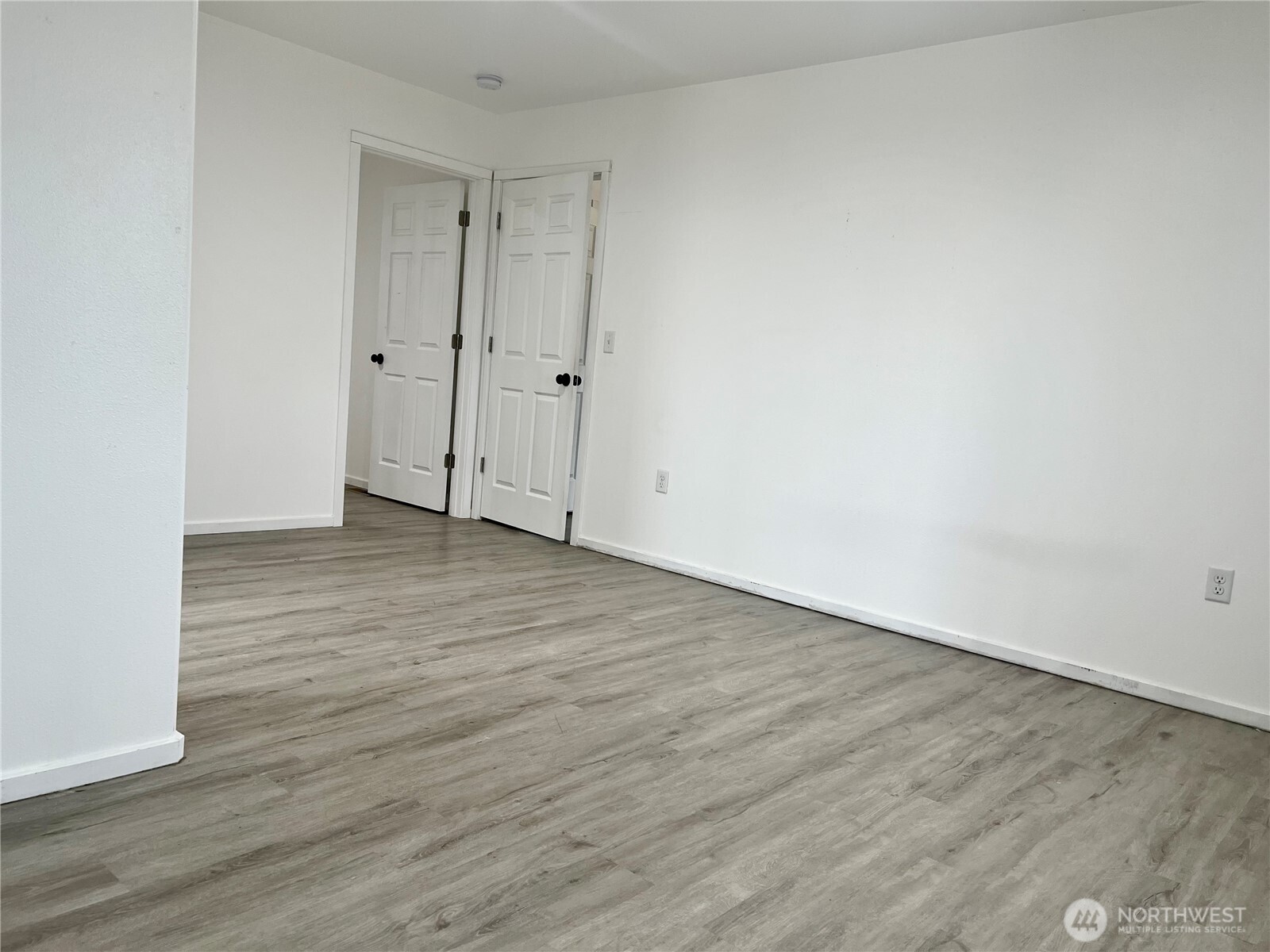38 Miller Road Omak, WA 98841 - Photo 11 of 29 a view of an empty room with wooden floor