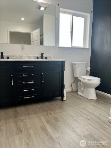 a bathroom with a sink and a toilet