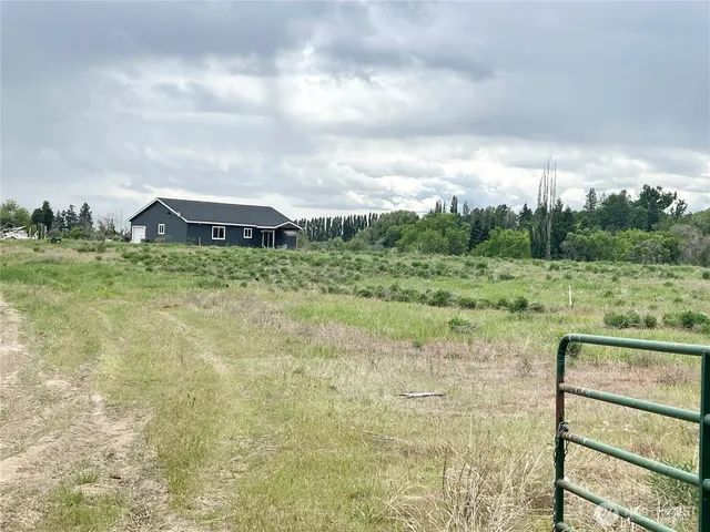 a view of a garden with an outdoor space
