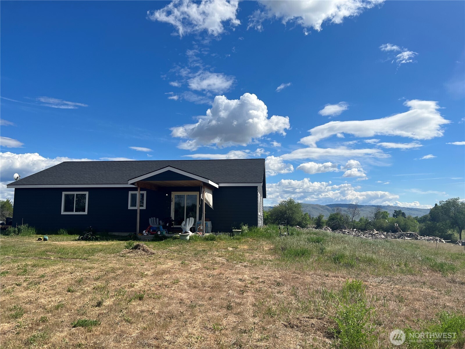 38 Miller Road Omak, WA 98841 - Photo 27 of 29 a front view of a house with a yard