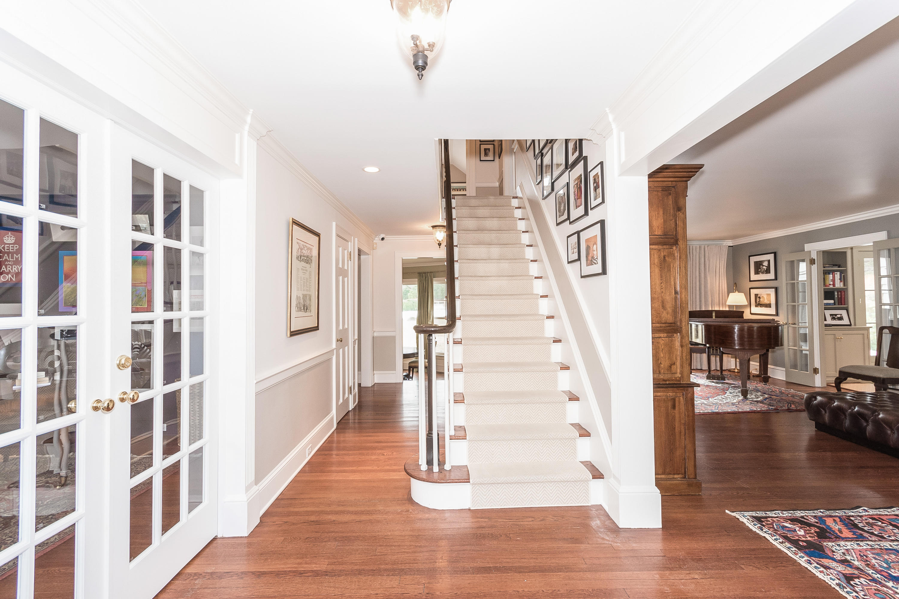 370 Wahackme Road New Canaan, CT 06840 - Photo 3 of 35 a view of entryway and hall with wooden floor