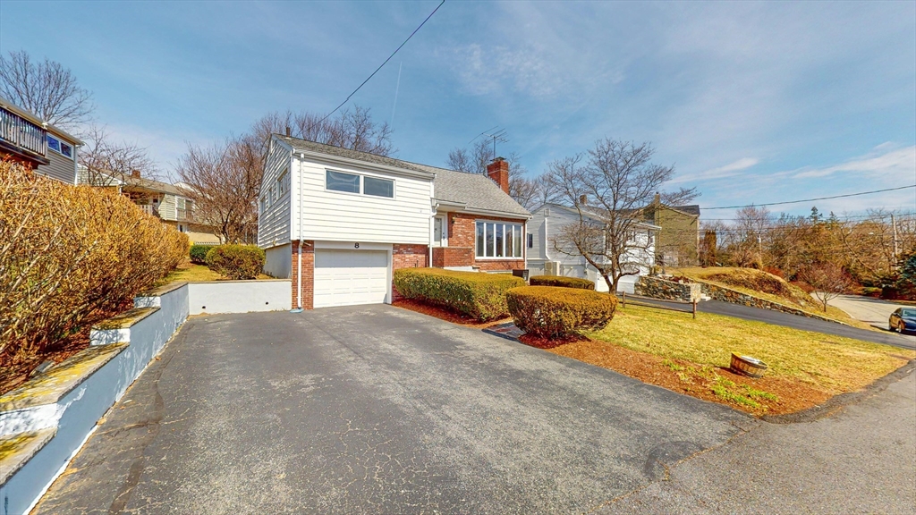 8 Stone Road Arlington, MA 02474 - Photo 3 of 26 a view of a swimming pool with a lounge chairs