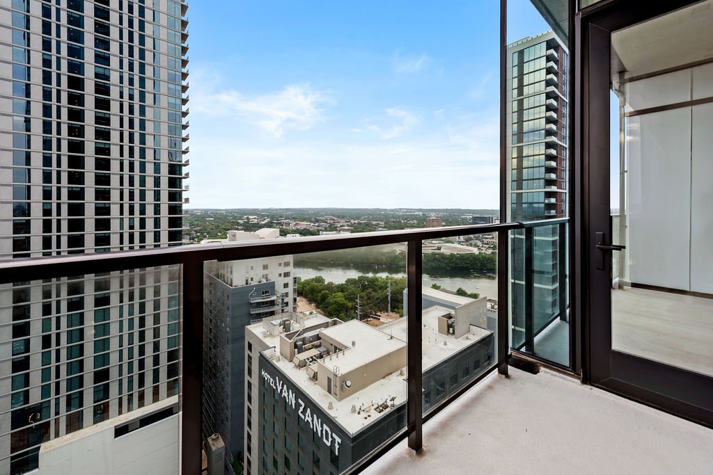 610 Davis Street, Unit 2504 Austin, TX 78701 - Photo 12 of 28 a view of a balcony with couches