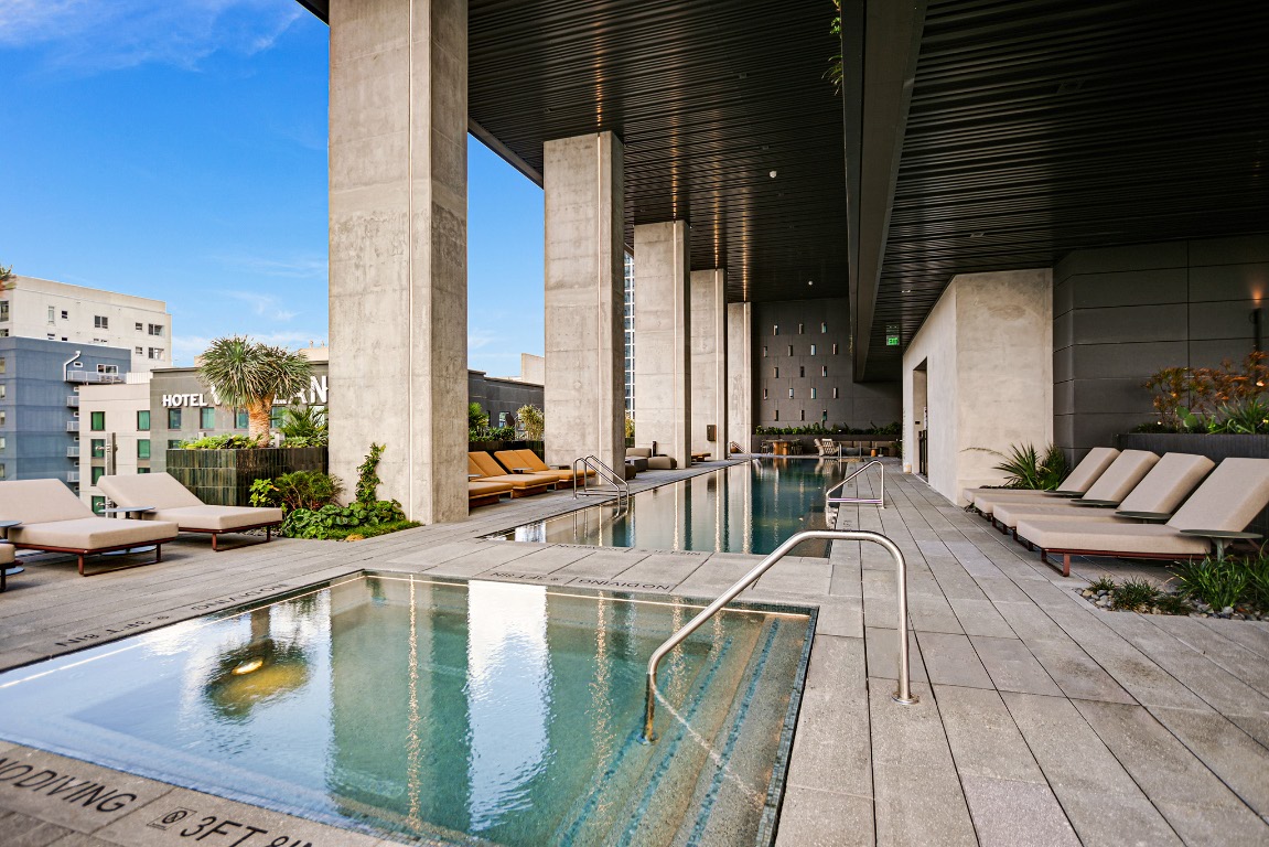610 Davis Street, Unit 2504 Austin, TX 78701 - Photo 21 of 28 a view of a swimming pool with outdoor seating