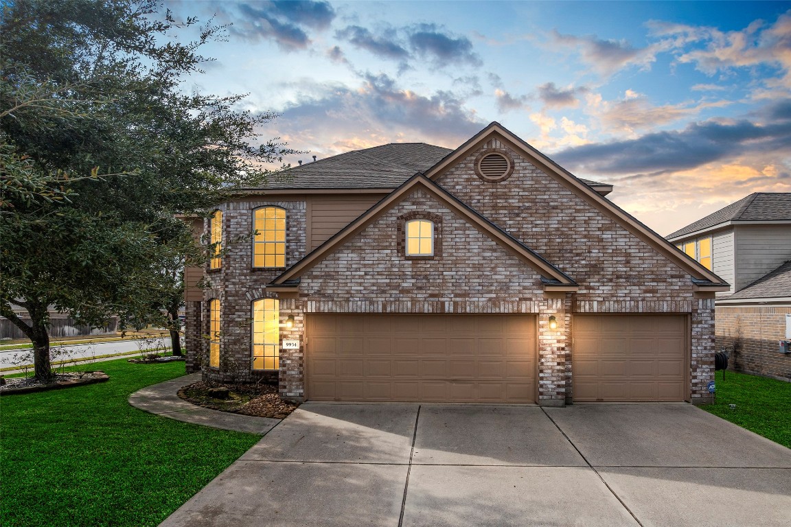 9934 Yearling Place Conroe, TX 77385 - Photo 1 of 47 Front of home - twilight
