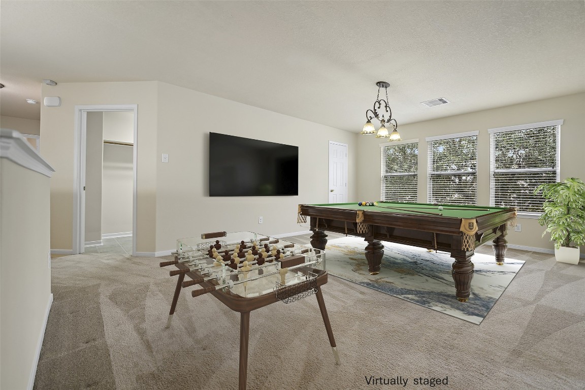 9934 Yearling Place Conroe, TX 77385 - Photo 23 of 47 Upstairs game room - virtually staged