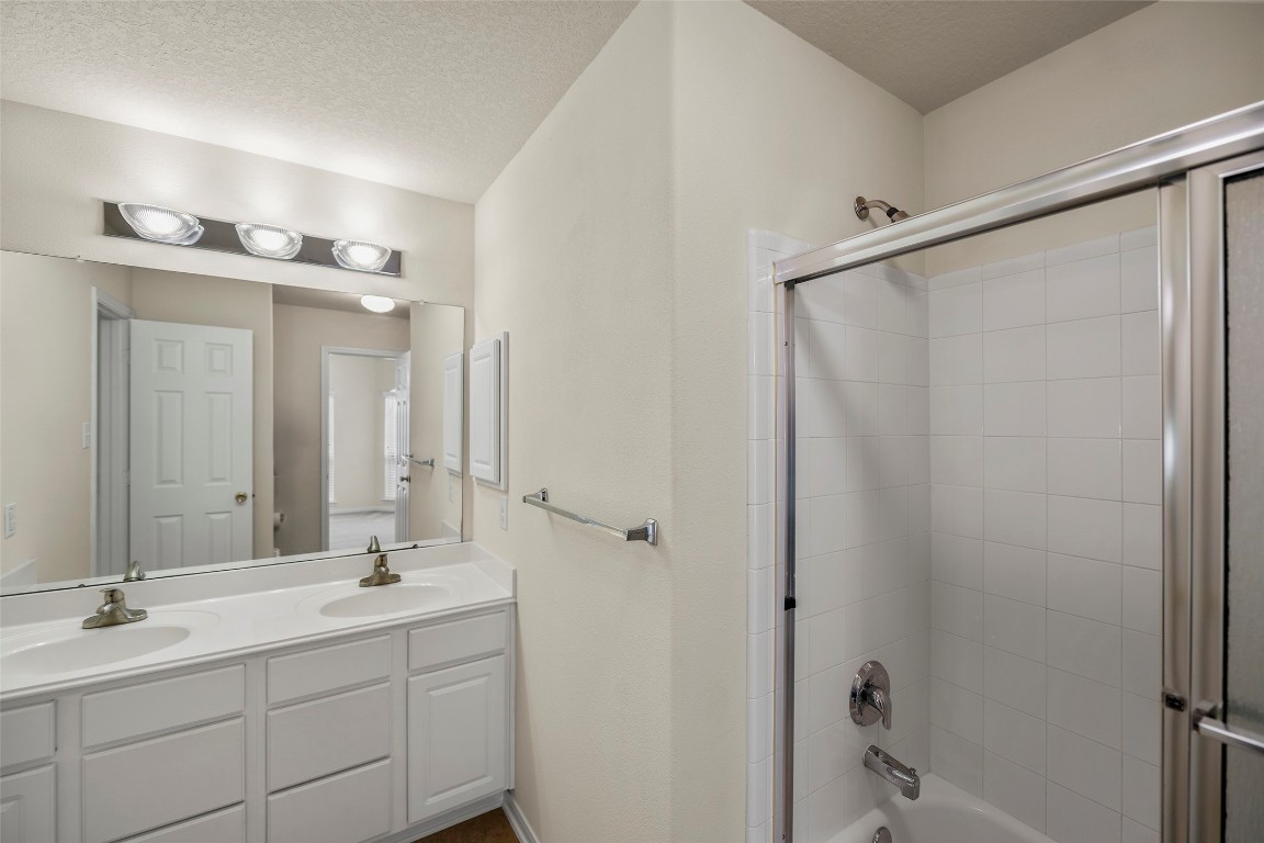 9934 Yearling Place Conroe, TX 77385 - Photo 36 of 47 The third bathroom, again with double sinks