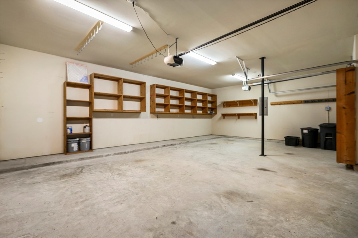 9934 Yearling Place Conroe, TX 77385 - Photo 39 of 47 3 car garage. Look at the shelving