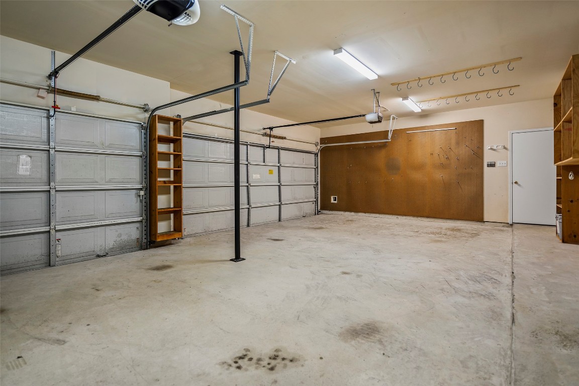 9934 Yearling Place Conroe, TX 77385 - Photo 40 of 47 3 car garage. Lots of space