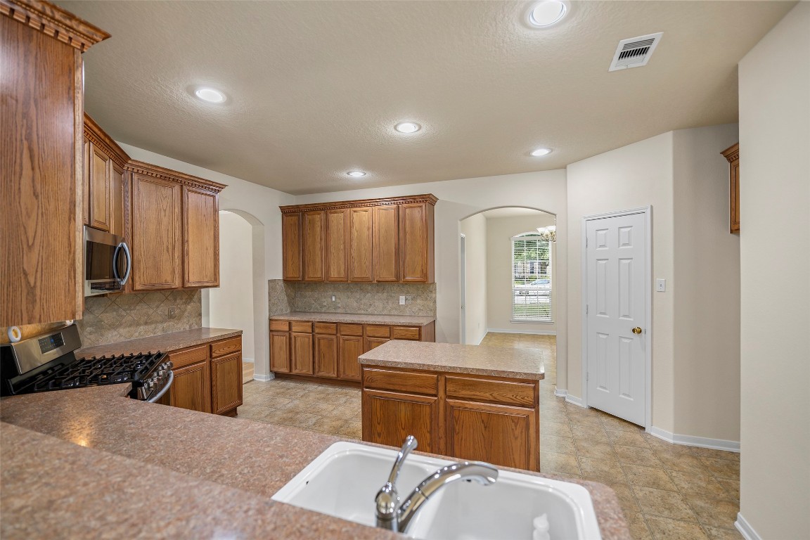 9934 Yearling Place Conroe, TX 77385 - Photo 8 of 47 Kitchen from family room
