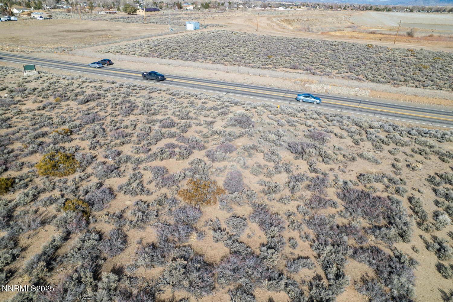 1181 Kimmerling Road Gardnerville, NV 89460 - Photo 23 of 26 a view of a dry yard with wooden floor