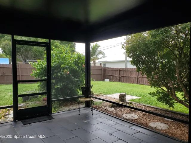 a garden view with a seating space