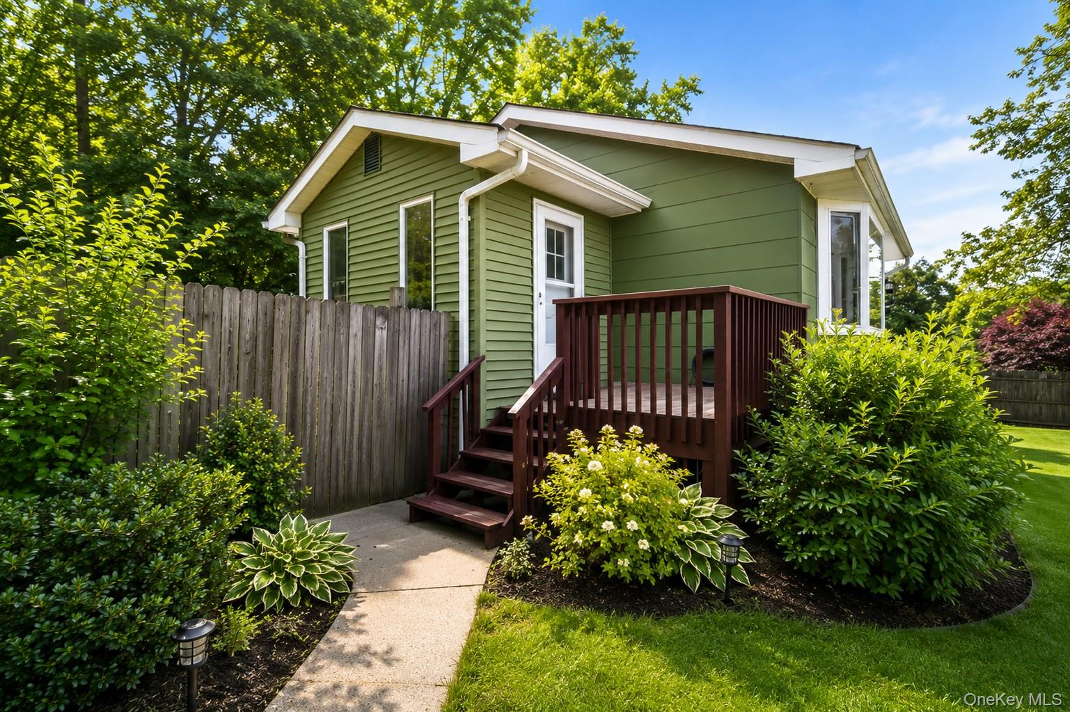1 Windsor Road Monroe, NY 10950 - Photo 3 of 20 a front view of a house with garden