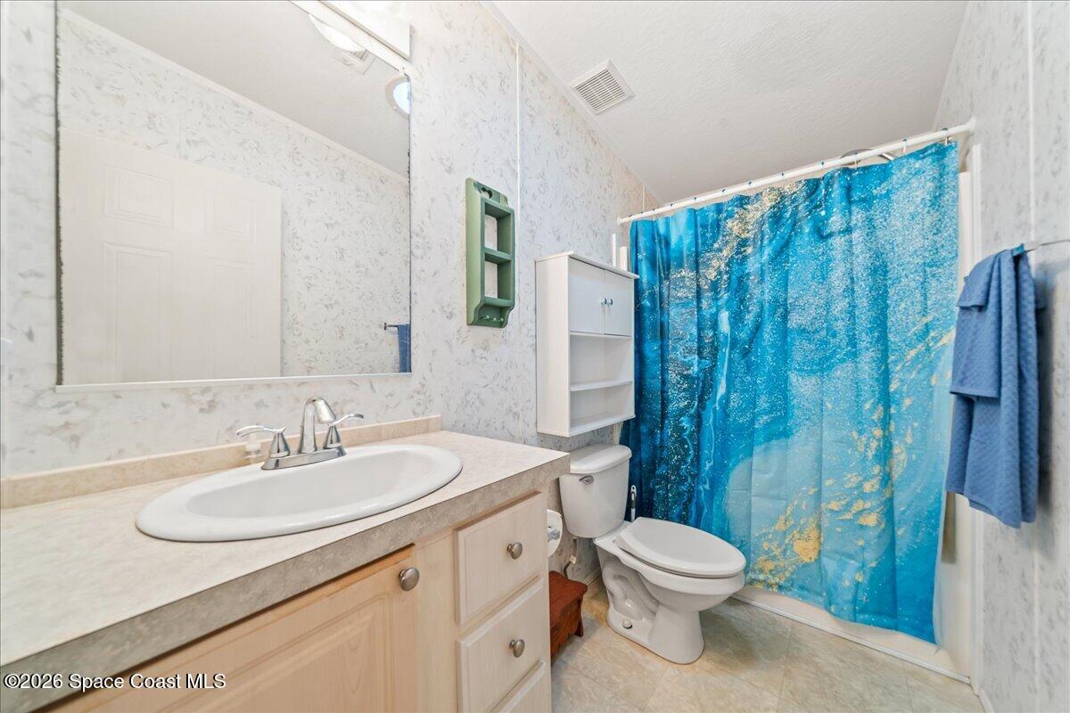 7628 Boxelder Road Micco, FL 32976 - Photo 17 of 34 Guest Bathroom