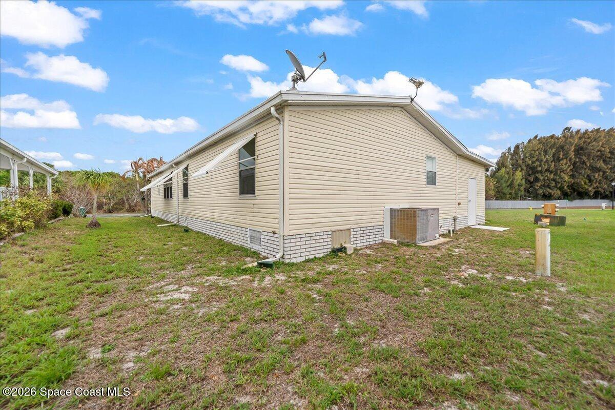 7628 Boxelder Road Micco, FL 32976 - Photo 27 of 34 Back View