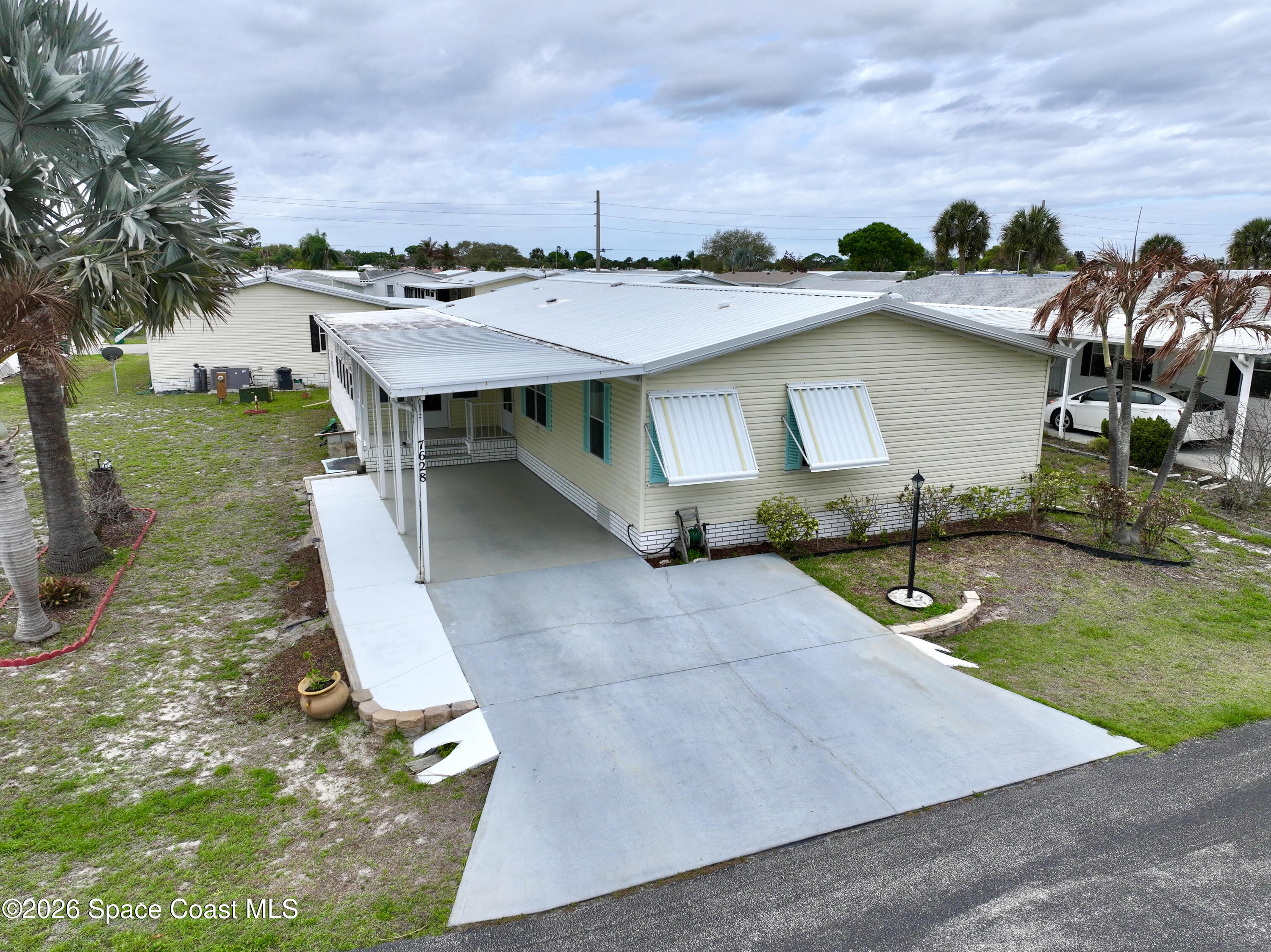 7628 Boxelder Road Micco, FL 32976 - Photo 29 of 34 Wide Driveway