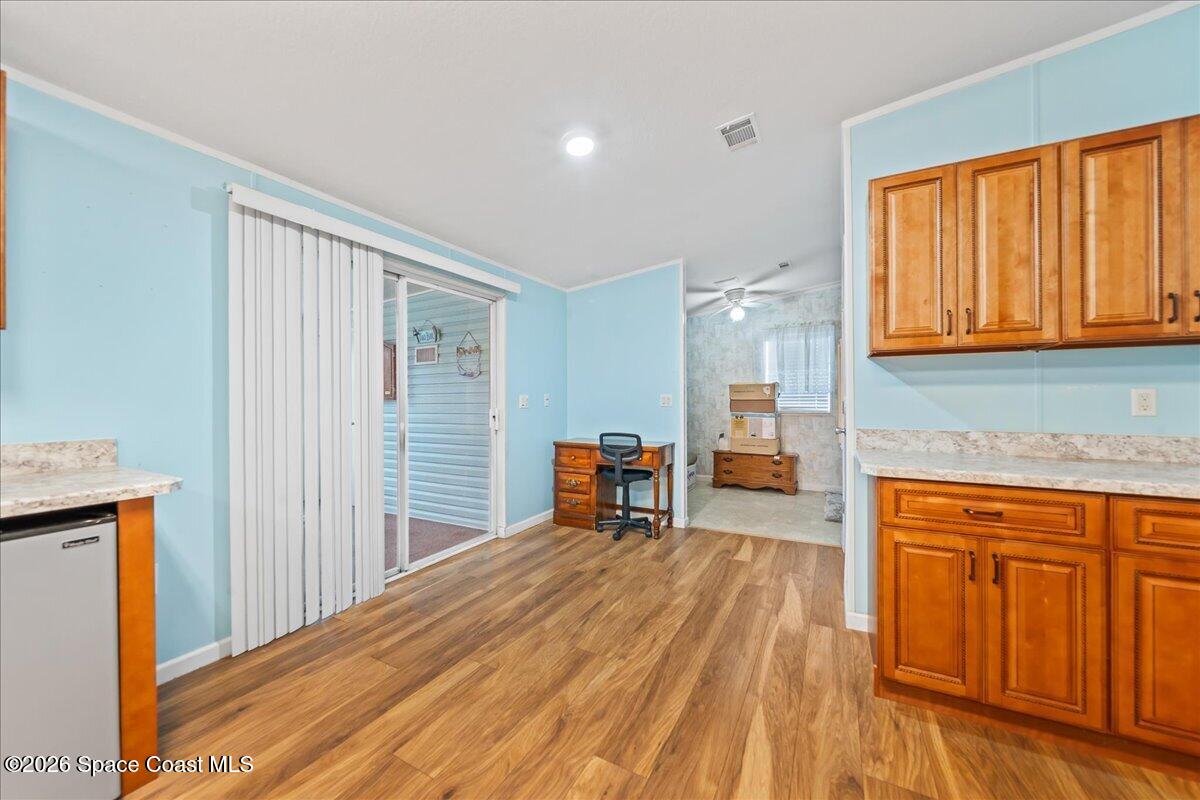 7628 Boxelder Road Micco, FL 32976 - Photo 8 of 34 Kitchen to Florida Room