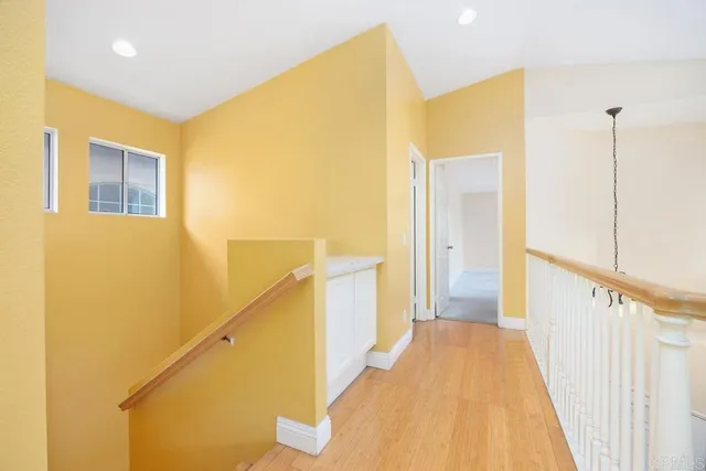 a view of a hallway with staircase