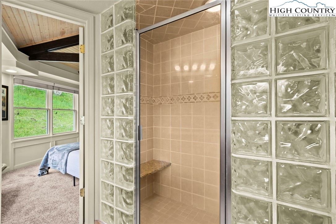 104 Longview Court Seven Devils, NC 28604 - Photo 20 of 46 a bathroom with a shower