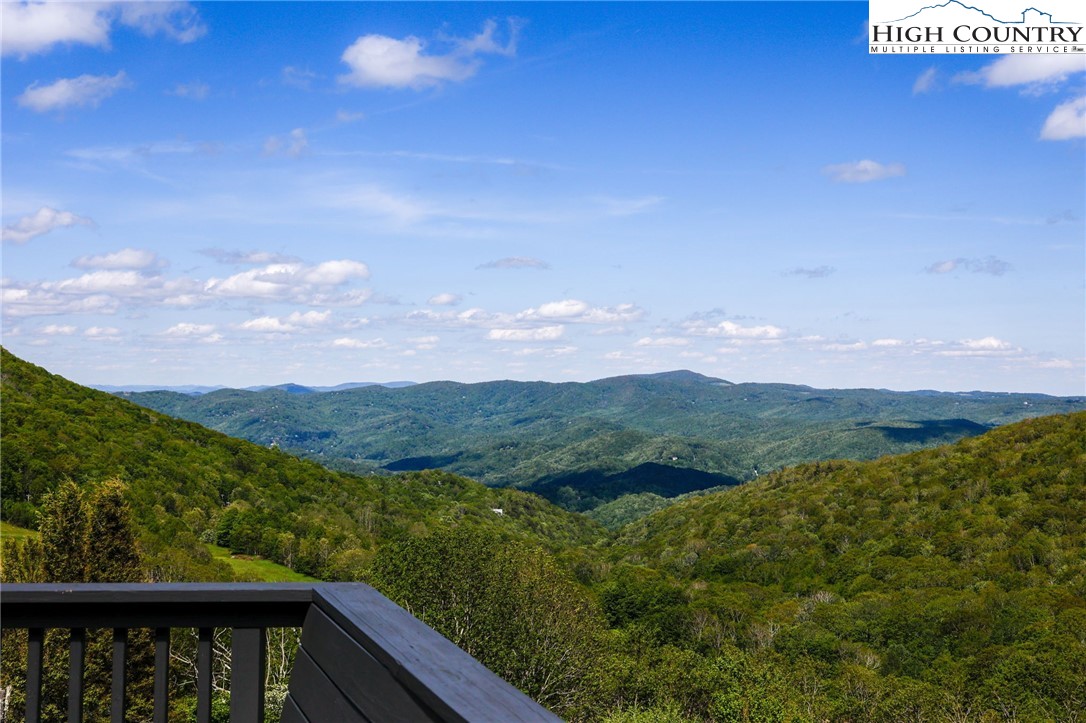 104 Longview Court Seven Devils, NC 28604 - Photo 2 of 46 a view of a mountain from a balcony