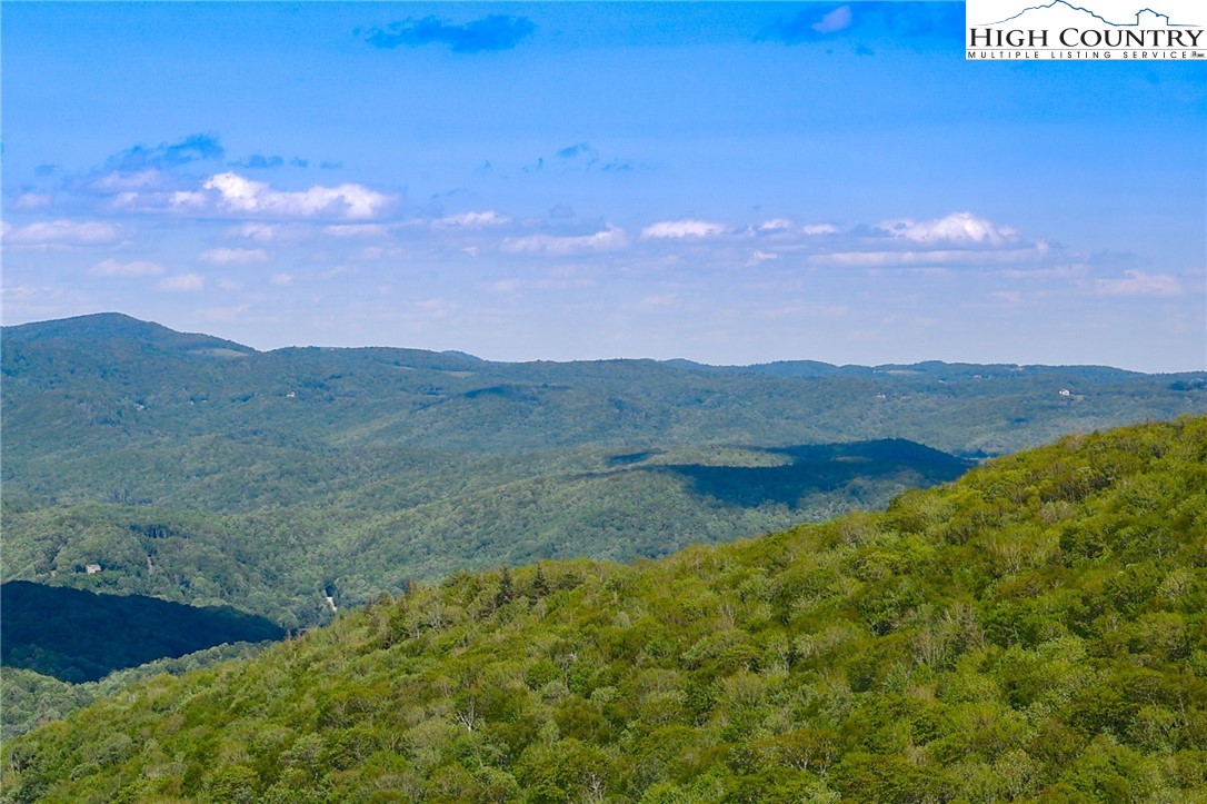 104 Longview Court Seven Devils, NC 28604 - Photo 35 of 46 a view of an outdoor space and mountain view