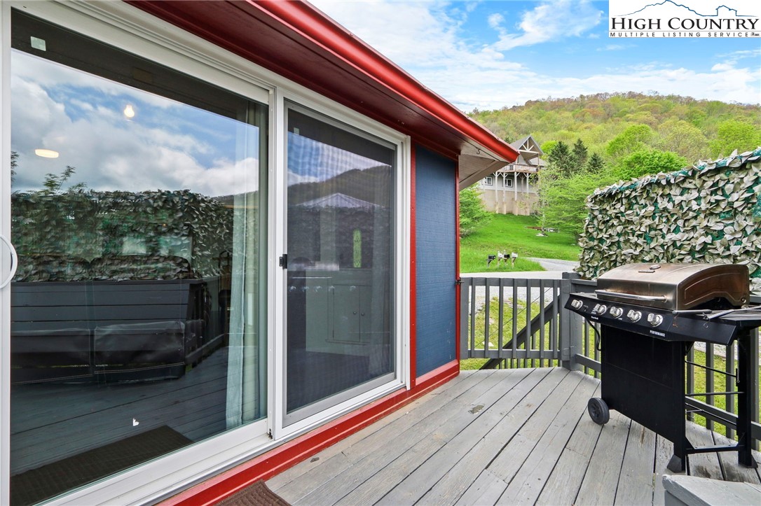 104 Longview Court Seven Devils, NC 28604 - Photo 36 of 46 a balcony with wooden floor