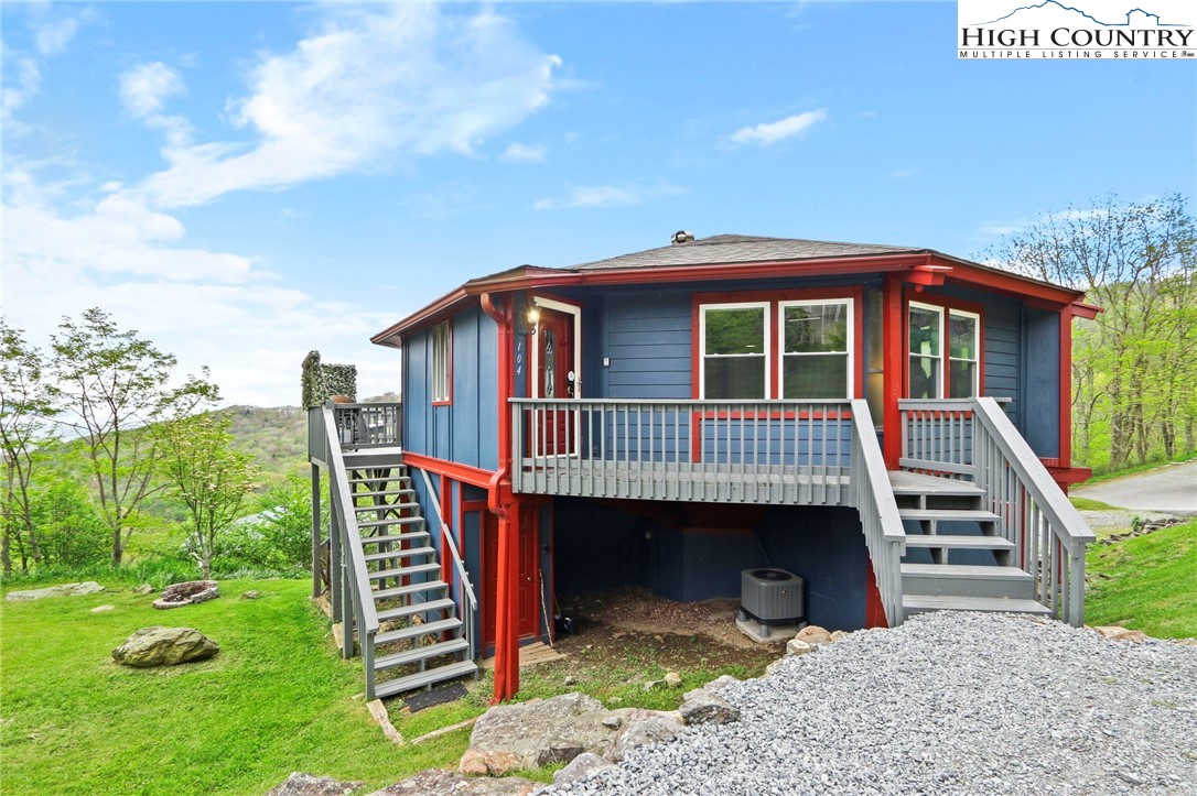 104 Longview Court Seven Devils, NC 28604 - Photo 37 of 46 a view of a house with a yard