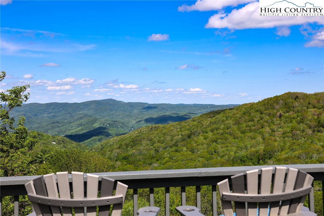 104 Longview Court Seven Devils, NC 28604 - Photo 4 of 46 a view of a two chairs on the roof deck