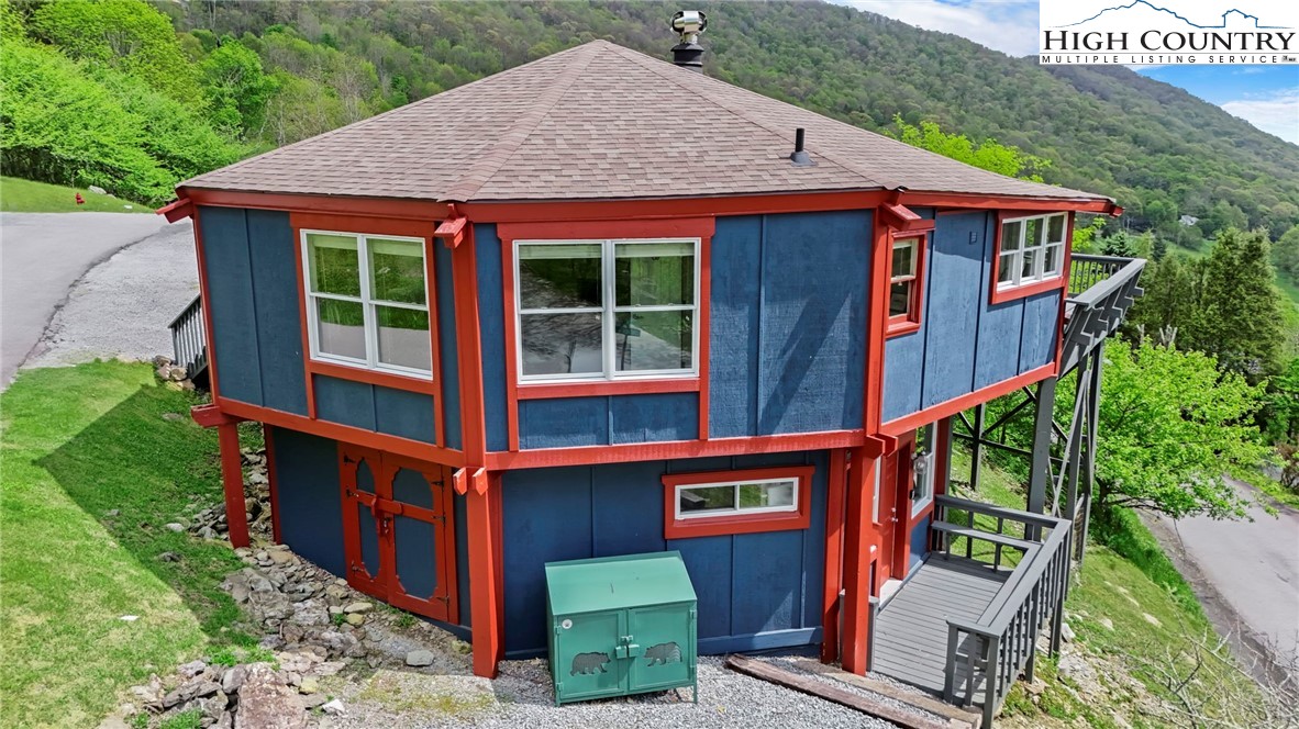 104 Longview Court Seven Devils, NC 28604 - Photo 43 of 46 a view of a house with a yard