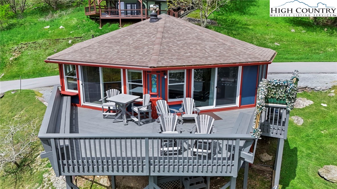 104 Longview Court Seven Devils, NC 28604 - Photo 46 of 46 a view of house with a deck and furniture
