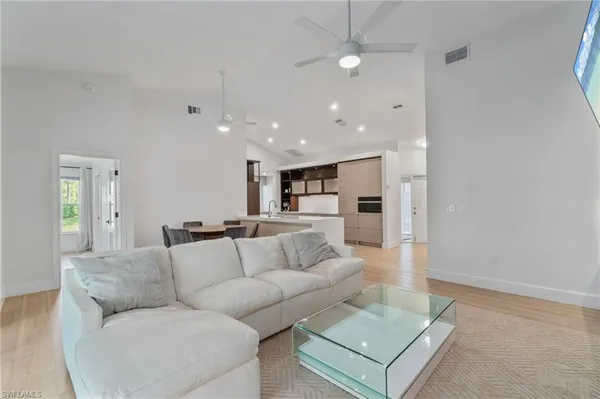 a living room with furniture and a couch