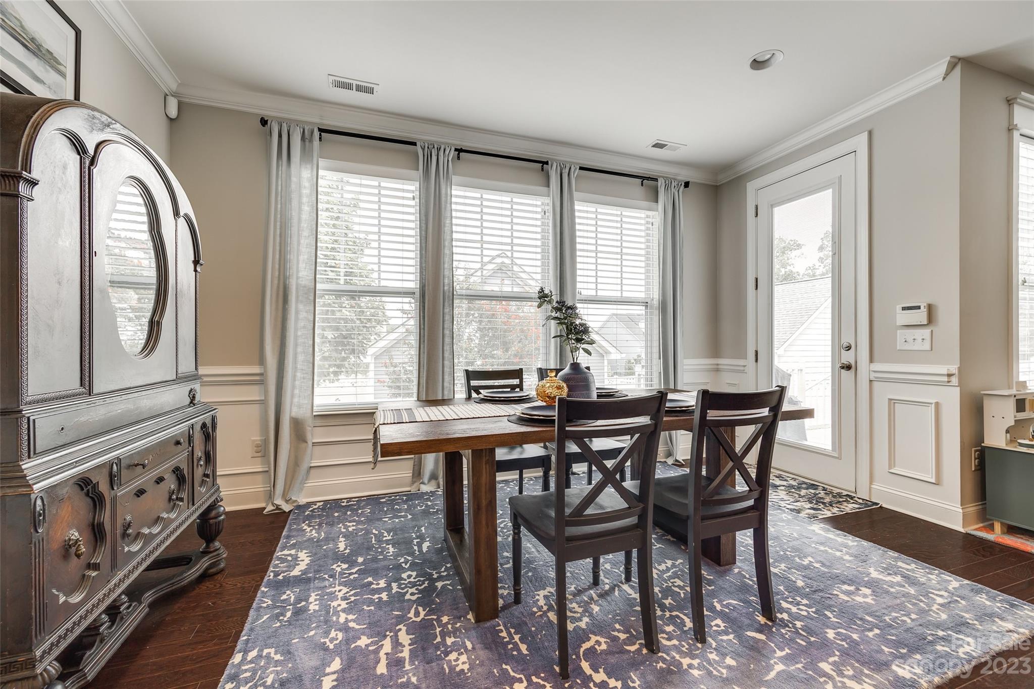 201 Helton Lane Fort Mill, SC 29708 - Photo 16 of 47 a view of a a dining room with furniture window and wooden floor