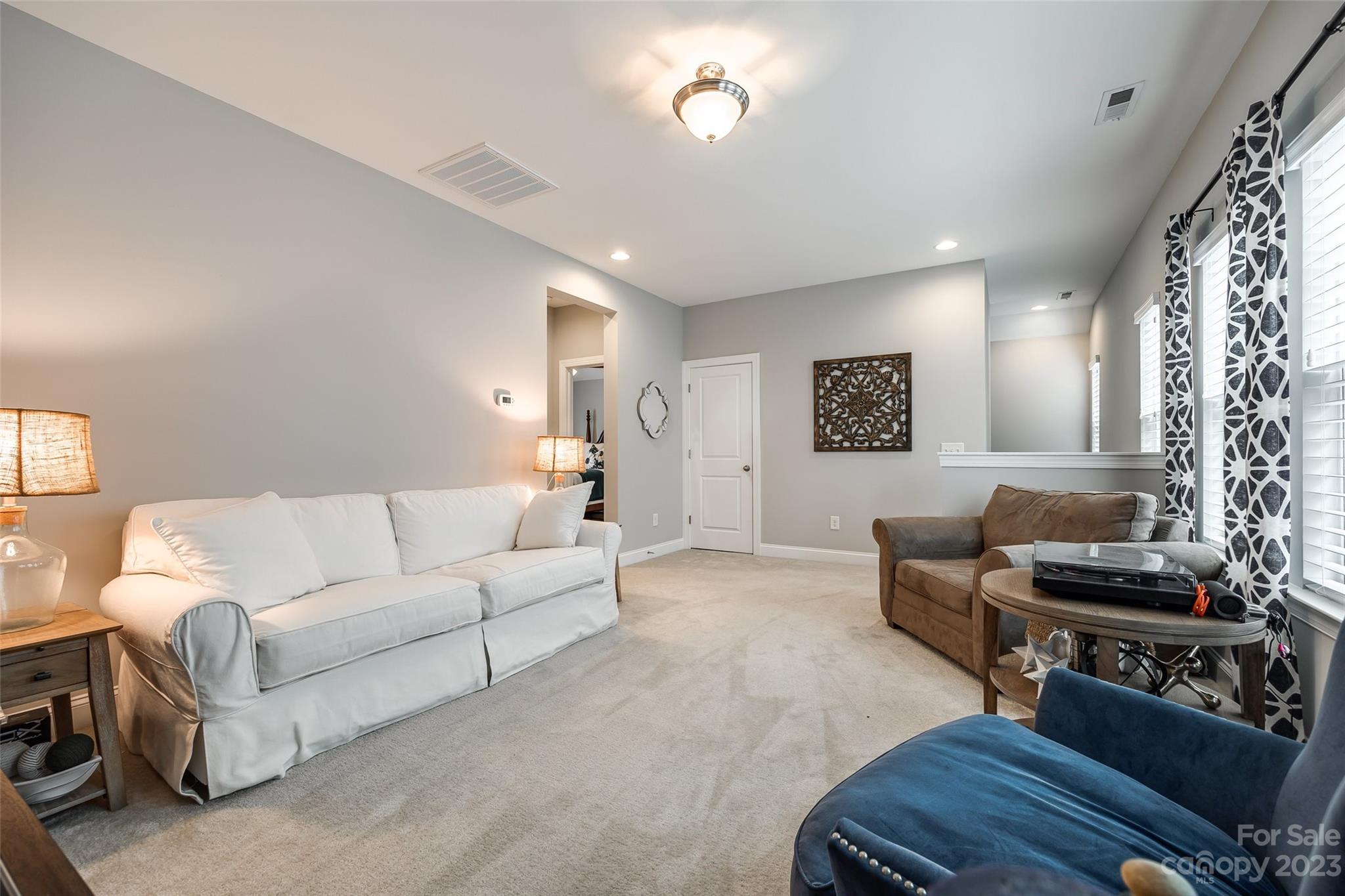 201 Helton Lane Fort Mill, SC 29708 - Photo 21 of 47 a living room with furniture and a window
